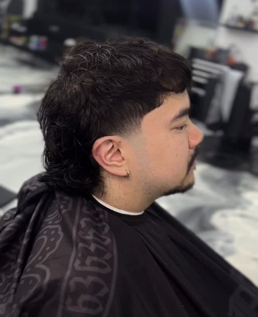 Curly mullet fade profile haircut