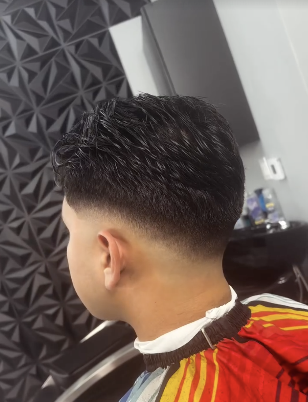 Clean skin fade haircut from the back