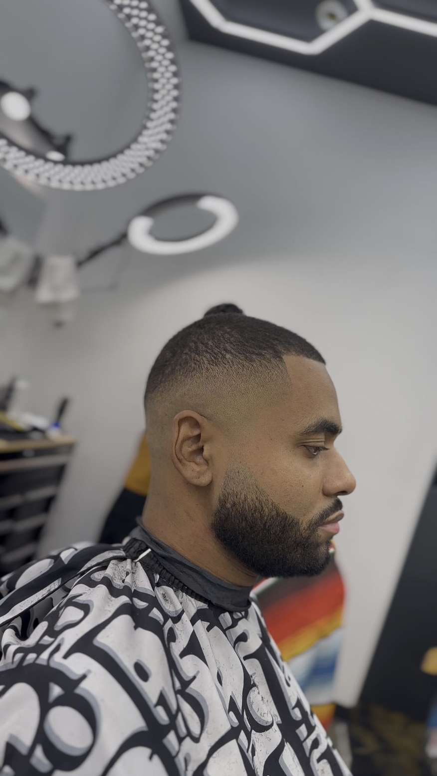 Sharp low taper haircut from the back